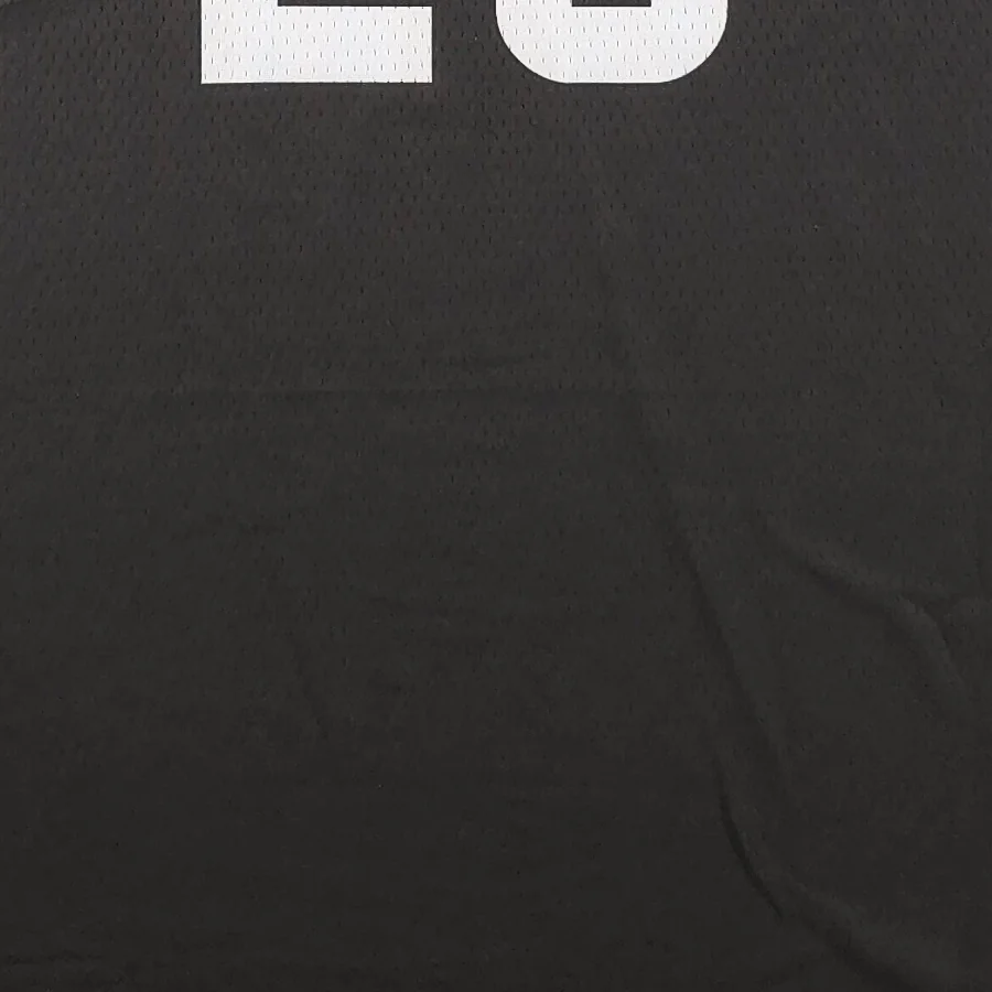 Close-up of black mesh fabric on a POXIOL basketball jersey
