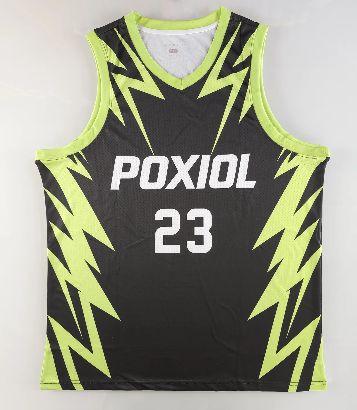 Black and neon green POXIOL basketball jersey with number 23